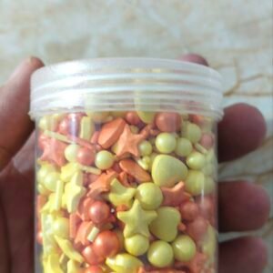 sprinkle edible star heatround miniature yellow and orange colour